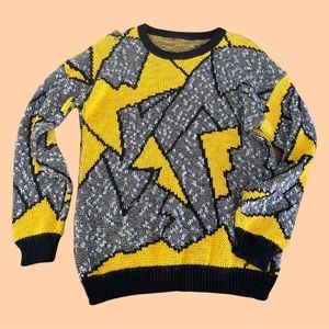 Cozy gray and yellow lightening bolt sweater.  
Best suited for a Small/Medium